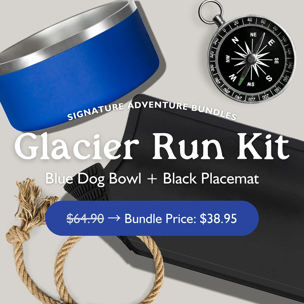 Flat lay shows OutPaw's Glacier Run Kit—Blue Bowl + Black Placemat, ideal for chilly adventures. Includes stainless steel bowl, non-slip placemat, rope & compass. Get it now for $38.95!.