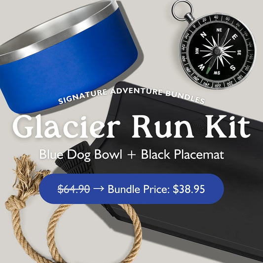 Flat lay shows OutPaw's Glacier Run Kit—Blue Bowl + Black Placemat, ideal for chilly adventures. Includes stainless steel bowl, non-slip placemat, rope & compass. Get it now for $38.95!.
